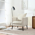 Poltrona a botte con gambe in legno e cuscino lombare