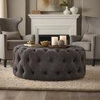 Pouf rotondo trapuntato con rotelle