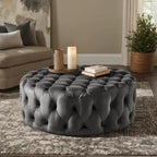 Pouf rotondo trapuntato con rotelle