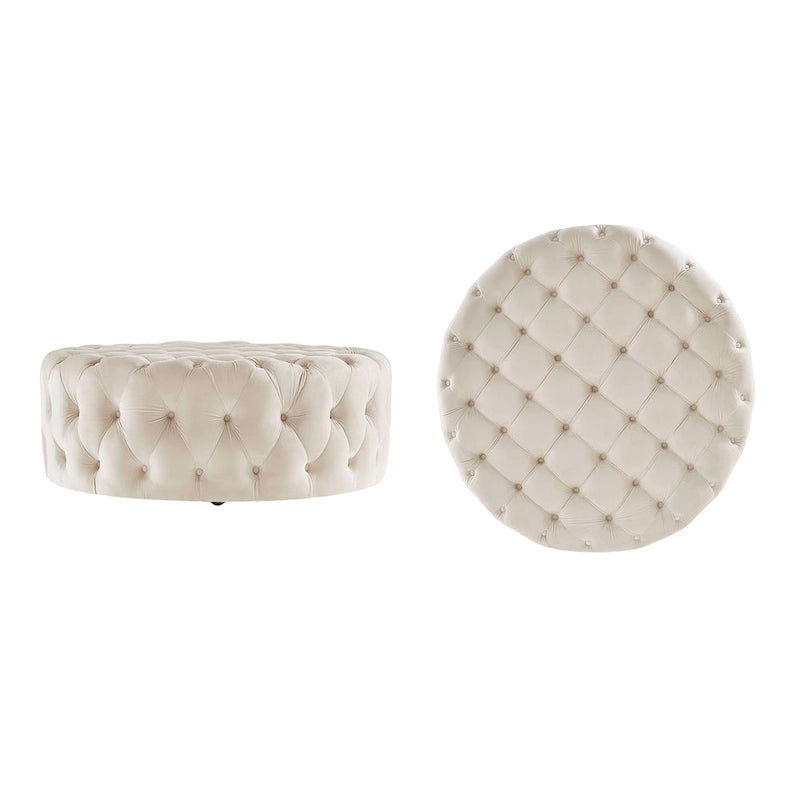 Pouf rotondo trapuntato con rotelle
