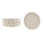 Pouf rotondo trapuntato con rotelle